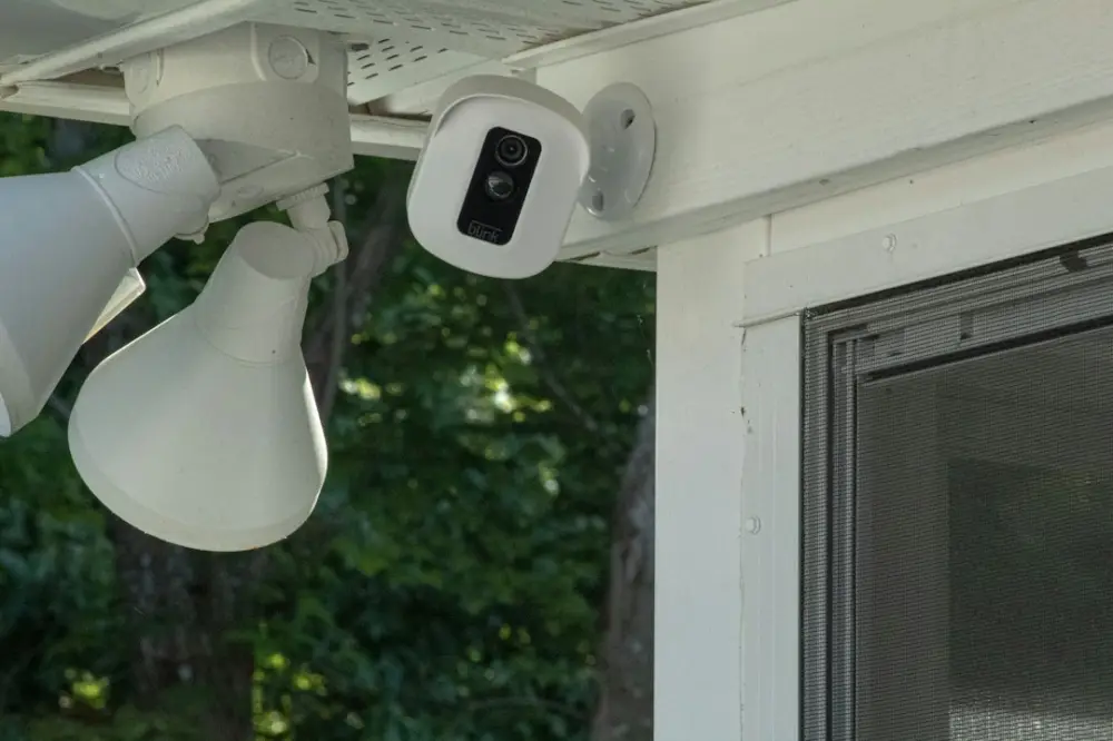 White and black security camera, illustrating outdoor security cameras